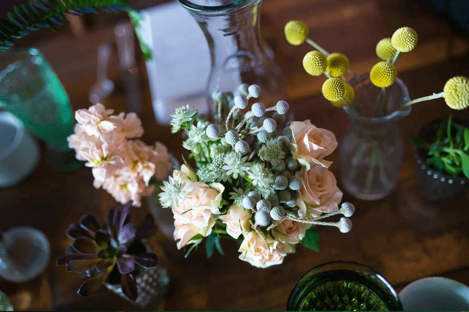 A delicate bouquet of mixed flowers in soft pastels.