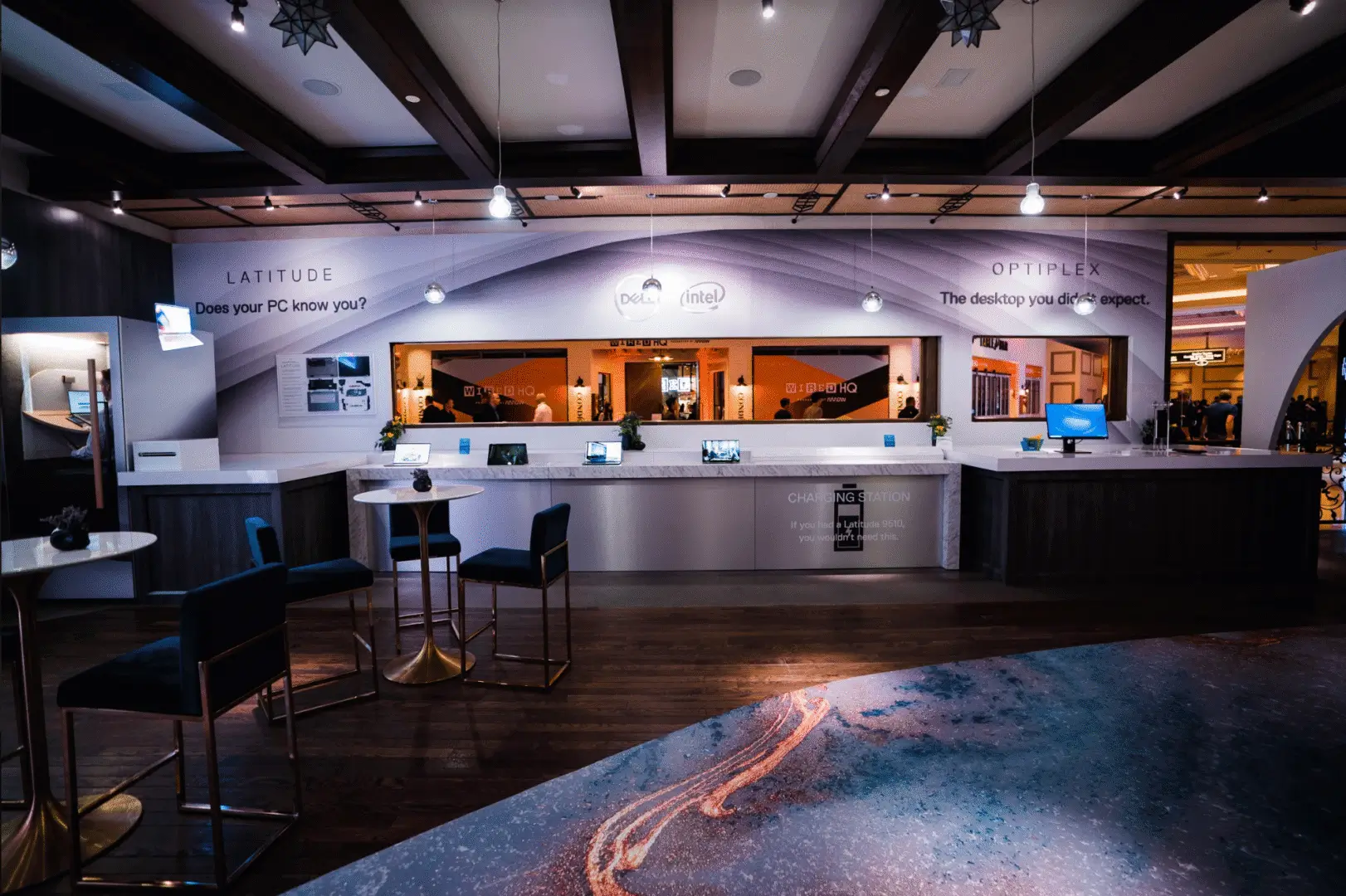 Modern bar area with sleek design and ambient lighting.